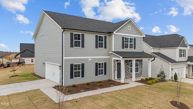 535 Husketh Rd, Youngsville, NC 27596 - view of front of property featuring driveway, a garage, a front lawn, and roof with shingles