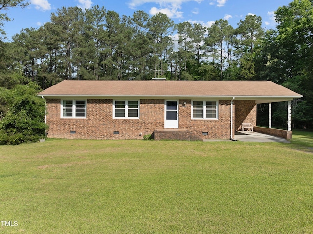 single story home featuring a carport and a front lawn