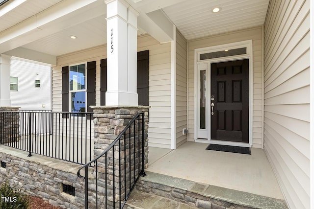 property entrance featuring a porch