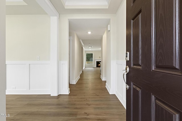 corridor featuring hardwood / wood-style floors