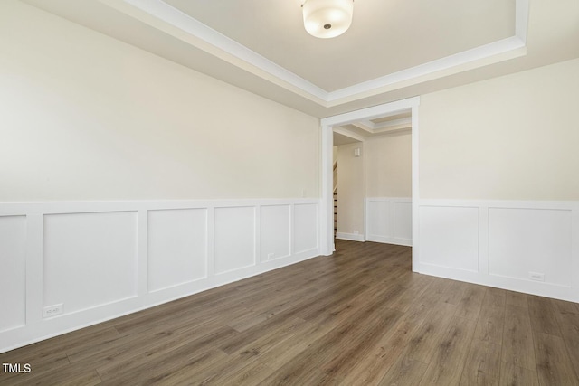 spare room with dark hardwood / wood-style flooring