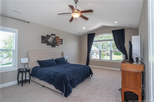 carpeted bedroom featuring ceiling fan and lofted ceiling