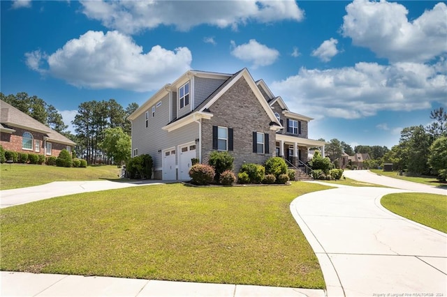 view of side of home featuring a garage and a yard