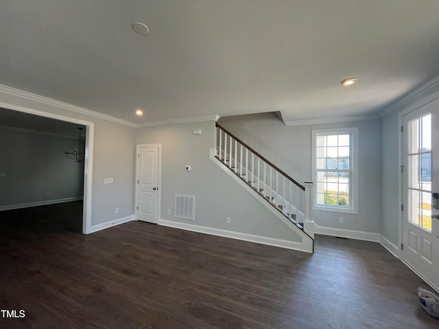 interior space featuring dark hardwood / wood-style floors and ornamental molding