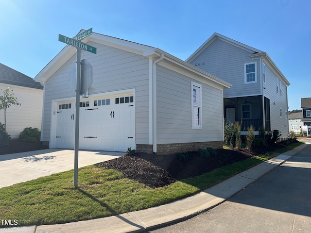 view of property exterior featuring a garage