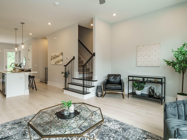 living room with light hardwood / wood-style floors