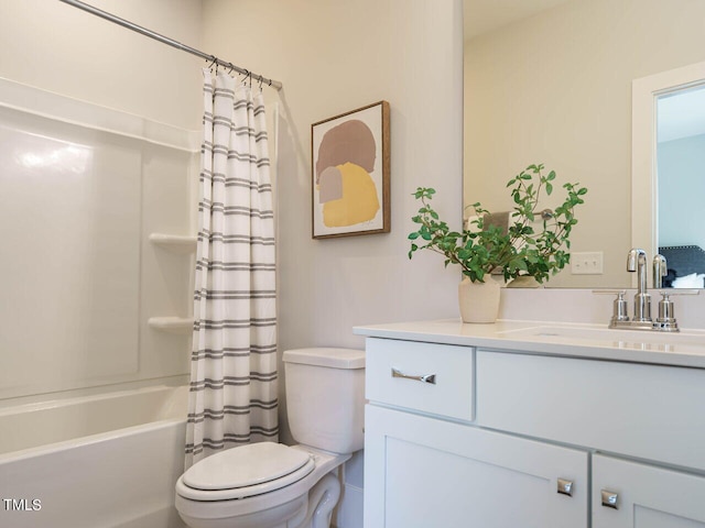 full bathroom featuring toilet, vanity, and shower / bath combo with shower curtain