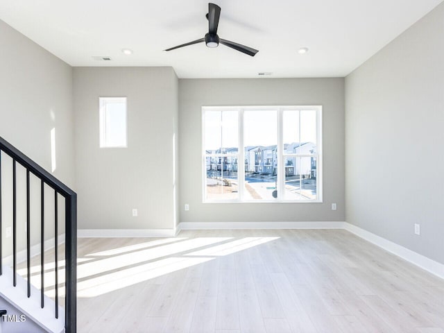 interior space featuring ceiling fan and light hardwood / wood-style flooring