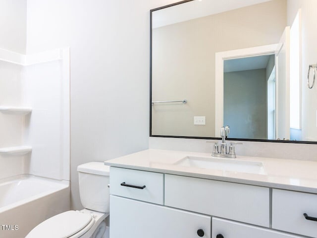 full bathroom with vanity, shower / bathtub combination, and toilet