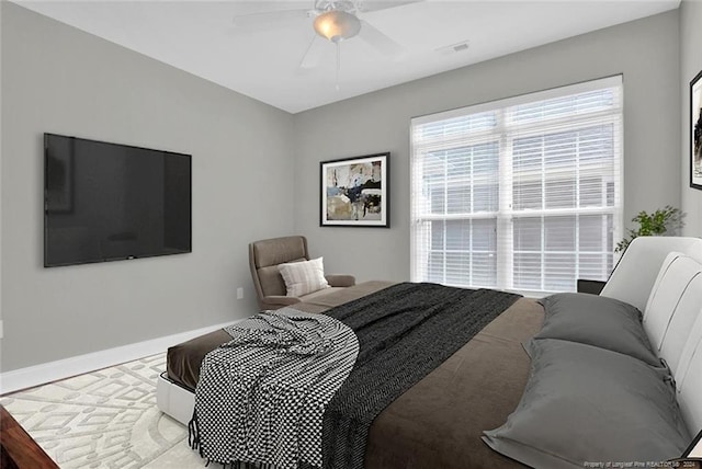 bedroom featuring ceiling fan