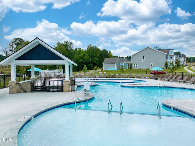 view of swimming pool featuring a patio