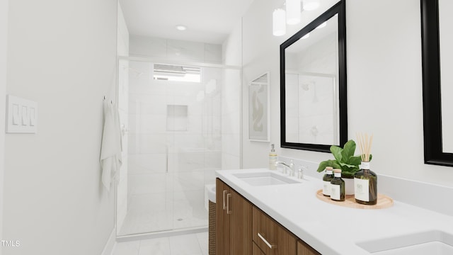 bathroom with vanity and walk in shower