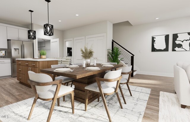 dining room featuring light wood-type flooring