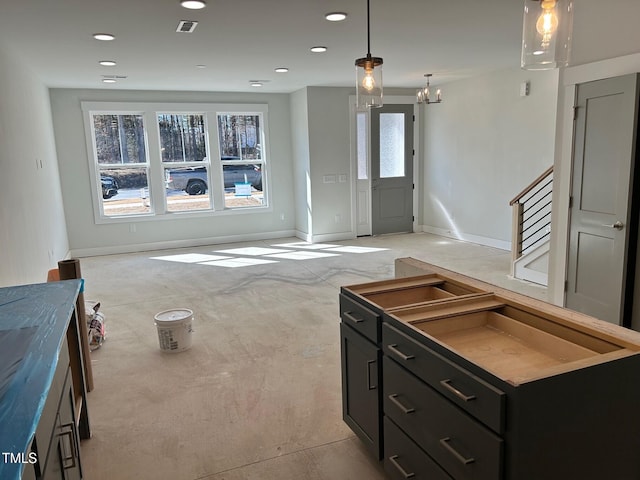 living room with hanging light fixtures