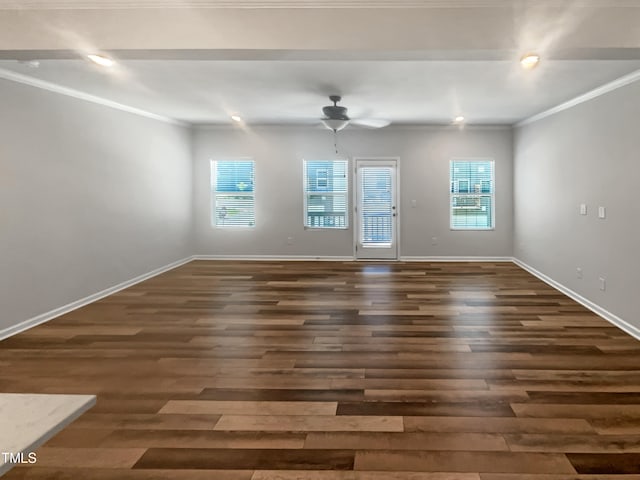 unfurnished room with dark hardwood / wood-style flooring, ceiling fan, and ornamental molding