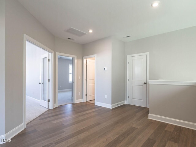 1713 Grassy Falls Ln, Wendell, NC 27591 - unfurnished bedroom with wood finished floors and recessed lighting
