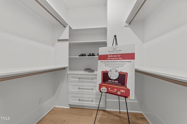 walk in closet featuring light wood-type flooring