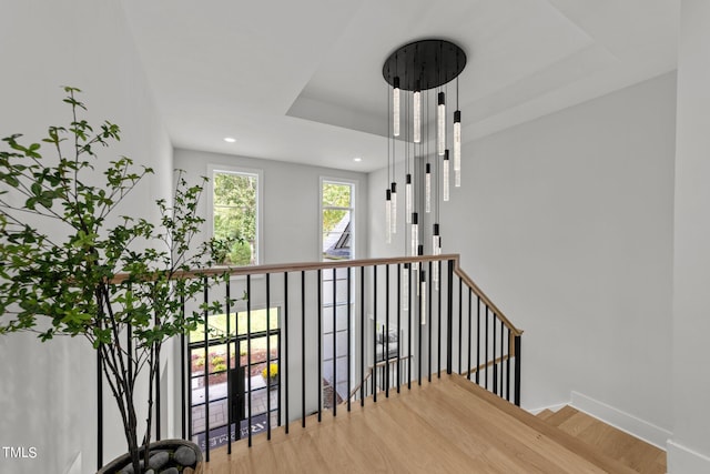 stairway featuring hardwood / wood-style flooring