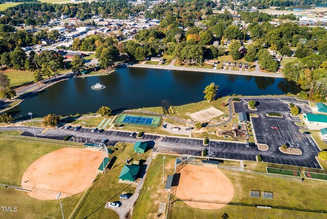 drone / aerial view with a water view