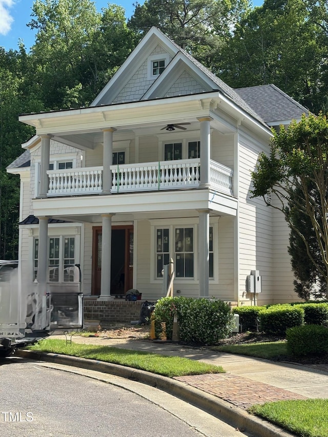 8305 Society Pl, Raleigh, NC 27615 - view of front of house featuring a balcony and covered porch