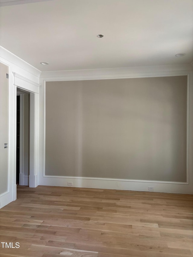 8305 Society Pl, Raleigh, NC 27615 - empty room featuring ornamental molding, light wood-style flooring, and recessed lighting