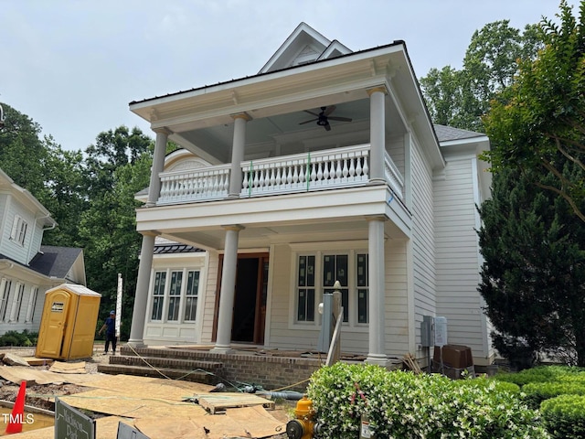 8305 Society Pl, Raleigh, NC 27615 - view of front of home featuring a balcony, covered porch, and ceiling fan