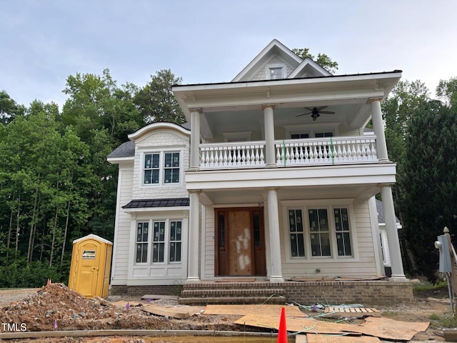 8305 Society Pl, Raleigh, NC 27615 - view of front of property with a balcony, covered porch, a standing seam roof, ceiling fan, and metal roof