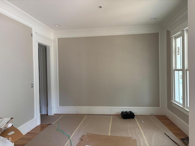 8305 Society Pl, Raleigh, NC 27615 - empty room featuring ornamental molding, wood finished floors, and recessed lighting