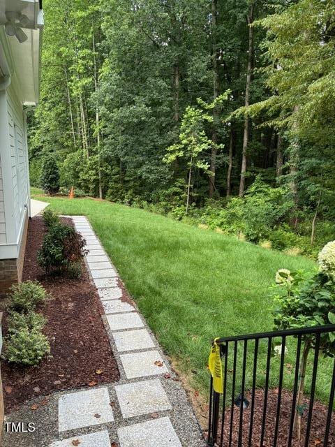 8305 Society Pl, Raleigh, NC 27615 - view of yard featuring a wooded view