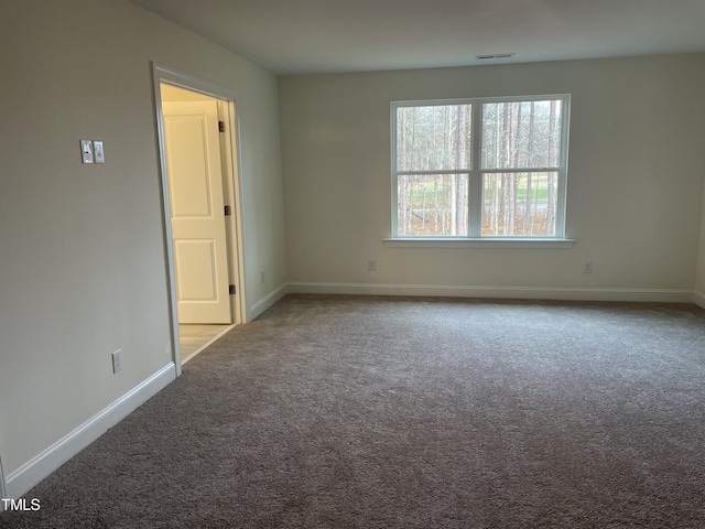 view of carpeted spare room