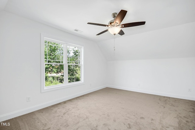 bonus room featuring carpet floors, vaulted ceiling, and ceiling fan