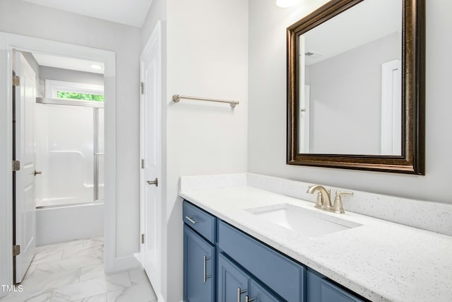 bathroom with bathing tub / shower combination and vanity