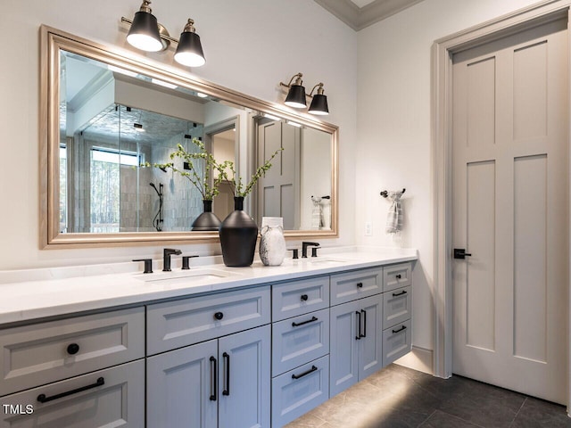 bathroom featuring vanity, tile patterned flooring, ornamental molding, and an enclosed shower