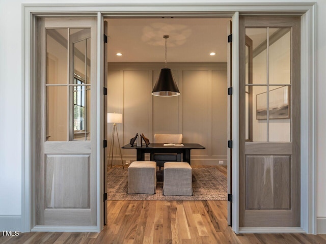 entryway featuring hardwood / wood-style flooring