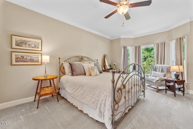 bedroom with baseboards, a ceiling fan, crown molding, and light carpet