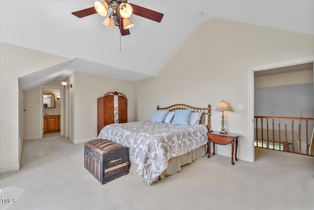 carpeted bedroom with baseboards, a ceiling fan, and lofted ceiling