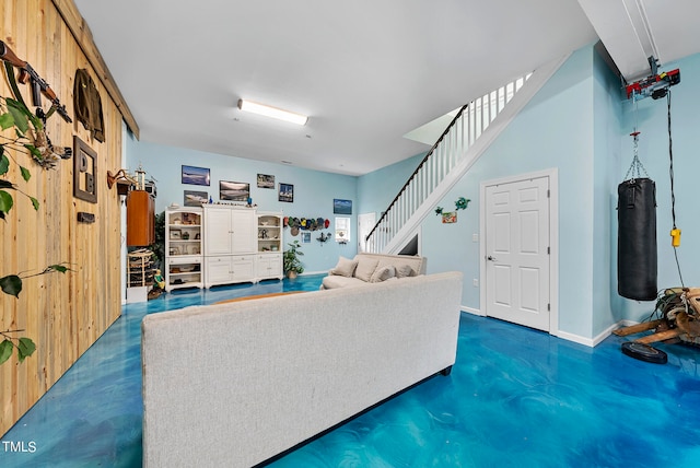 living room with concrete flooring