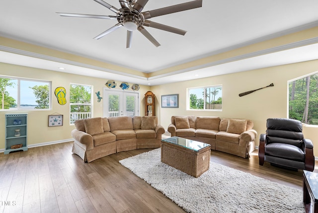 living room with a wealth of natural light and hardwood / wood-style floors