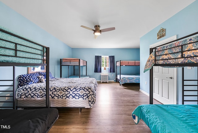 bedroom featuring ceiling fan and hardwood / wood-style flooring