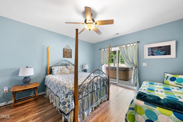 bedroom featuring ceiling fan and hardwood / wood-style floors