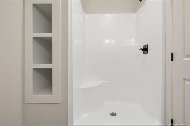 bathroom featuring walk in shower