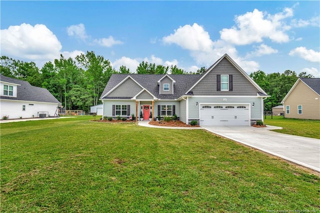 craftsman-style home featuring a garage, a front yard, and central air condition unit