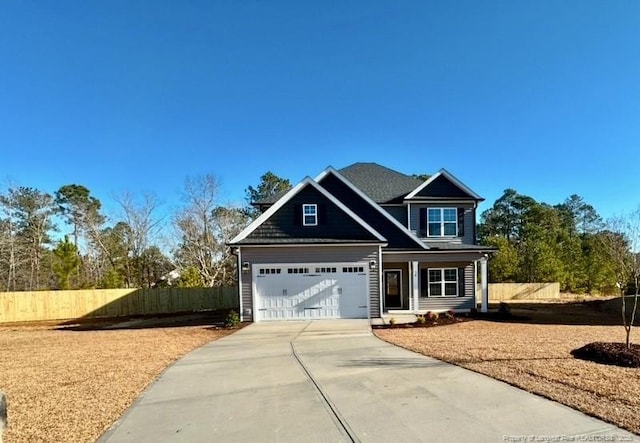 craftsman inspired home with a garage