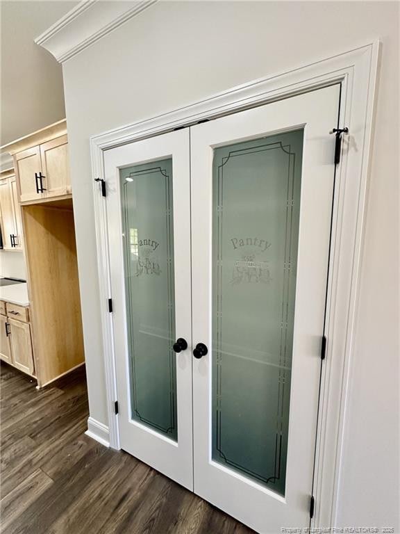 interior space featuring hardwood / wood-style floors and french doors