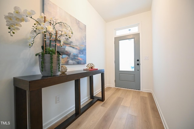 doorway with light hardwood / wood-style flooring