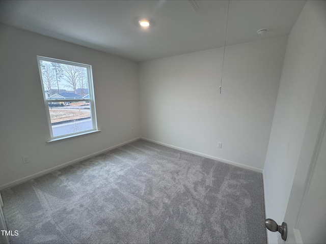 unfurnished room with carpet floors