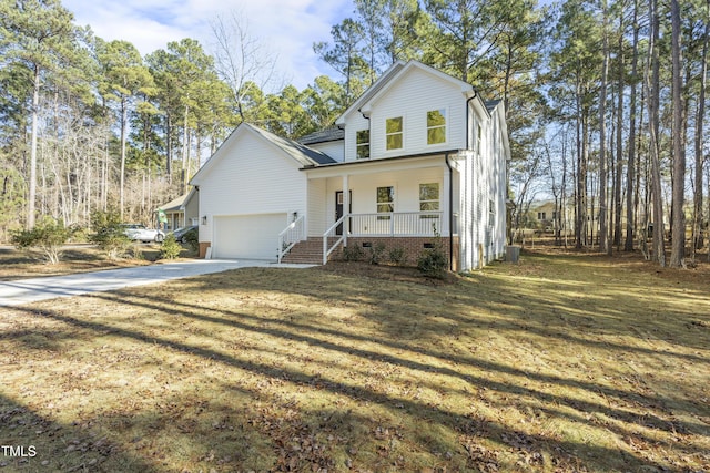 front of property with central AC unit, a garage, covered porch, and a front lawn