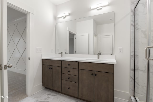 bathroom with vanity and an enclosed shower