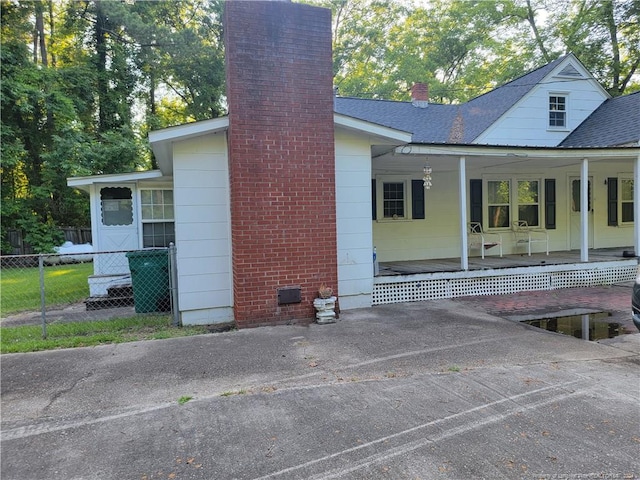 view of home's exterior with a porch