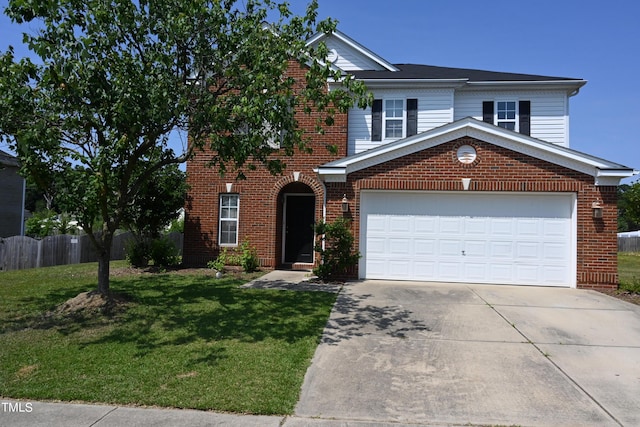 view of property with a garage and a front yard